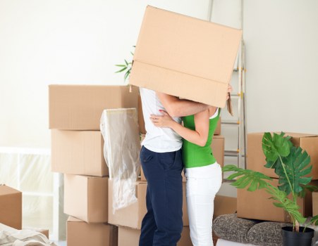 Packed boxes and furniture prepared for removals in Highamspark